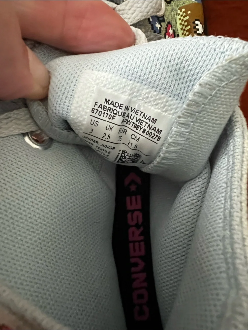 Converse Light Blue High-Top Sneakers with Pink Logo